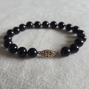 Vintage Black Beaded Bracelet with Gold Accent Hook Clasp